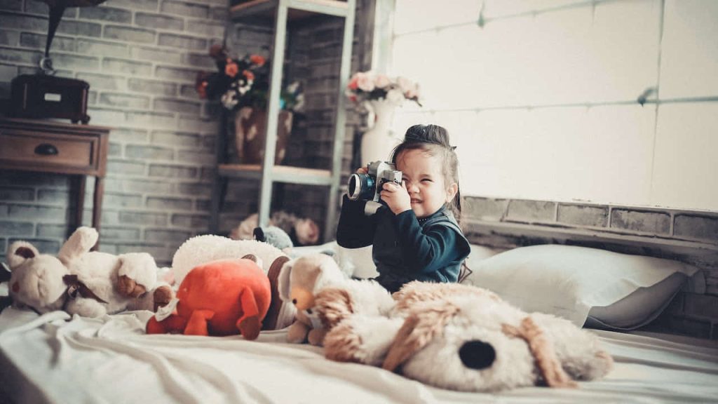 baby girl playing in her room