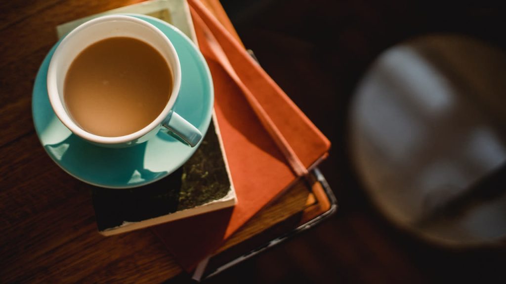 books and a coffee cup