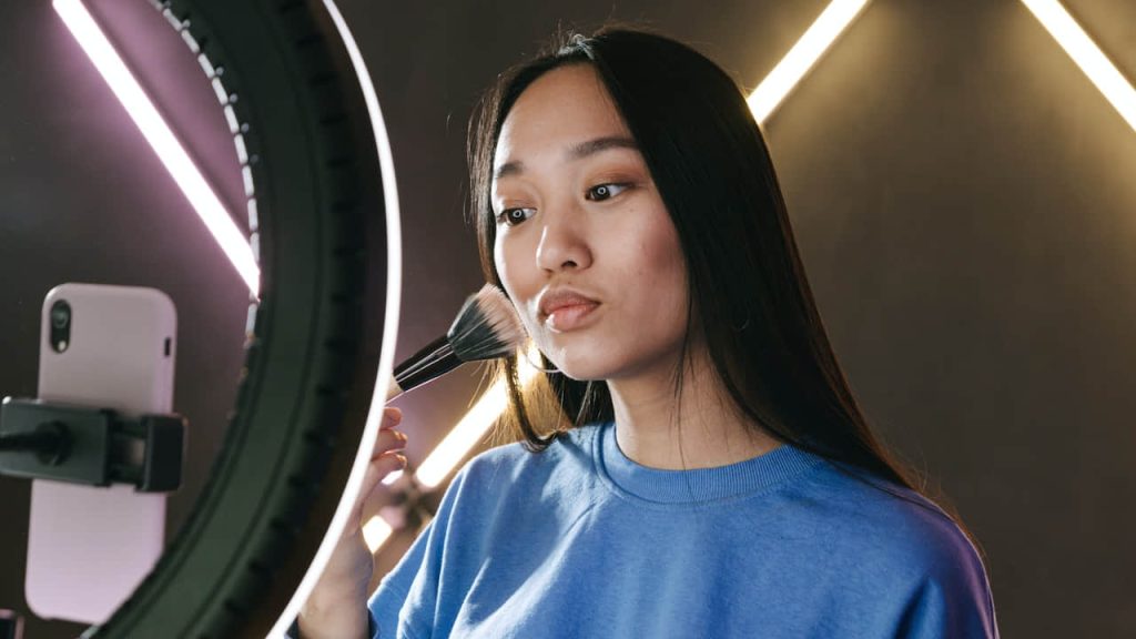 woman applying primer