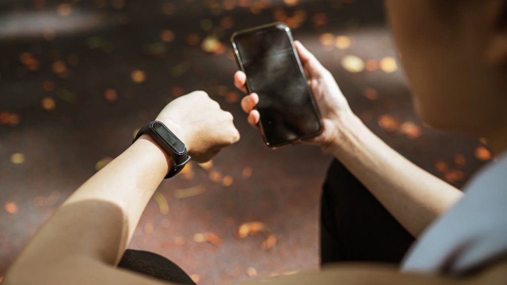 woman using devices for health monitoring