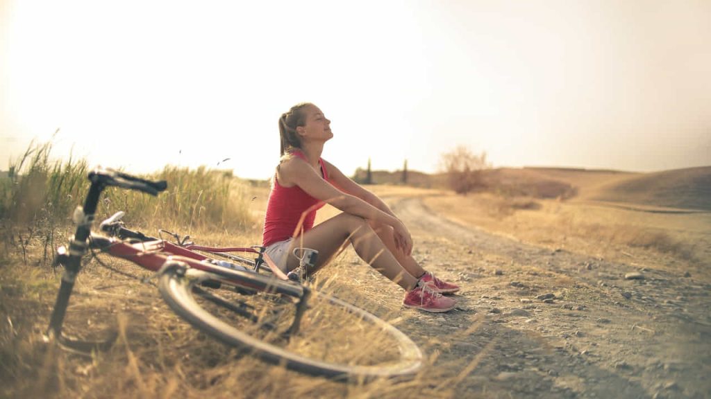 sportive woman with a bicycle