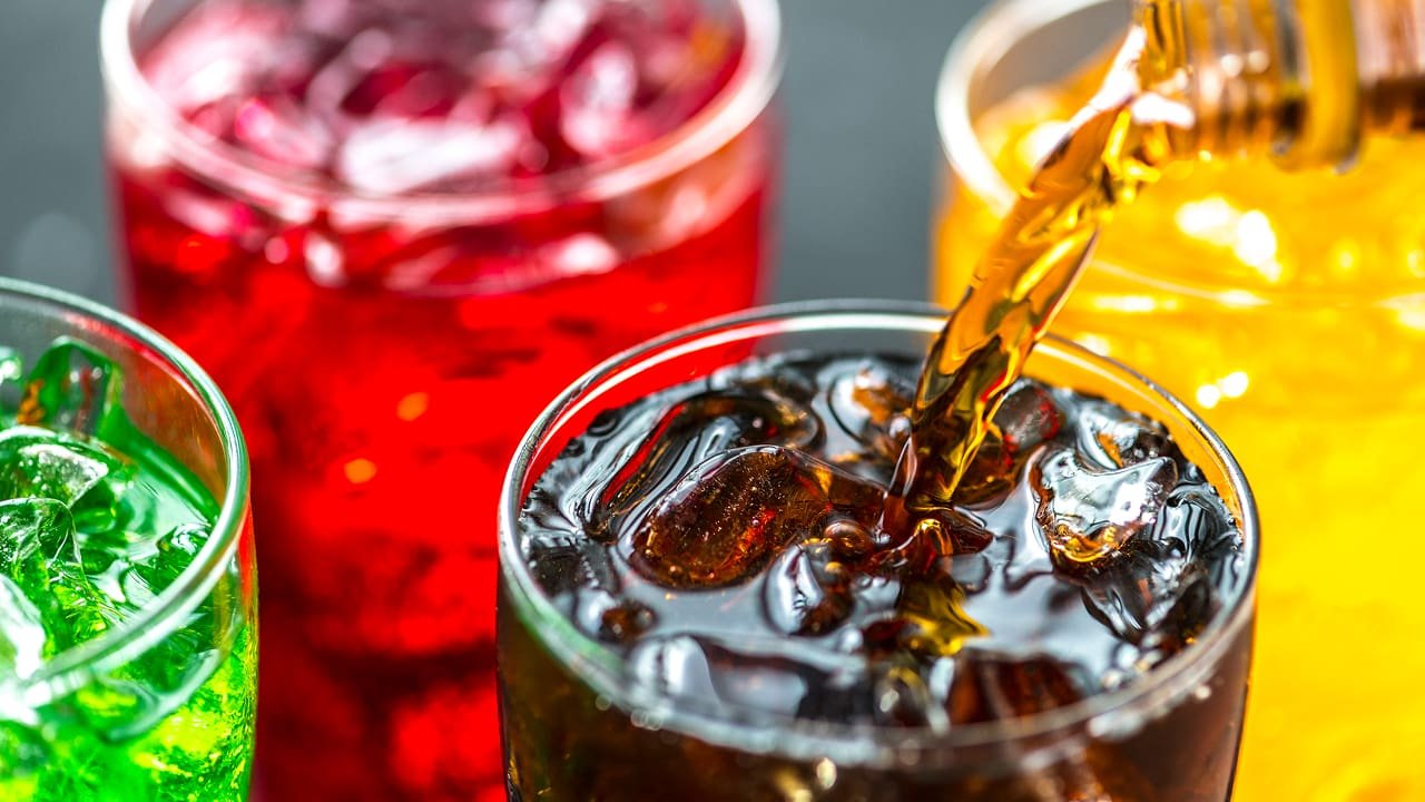 A shot of colorful soda drinks