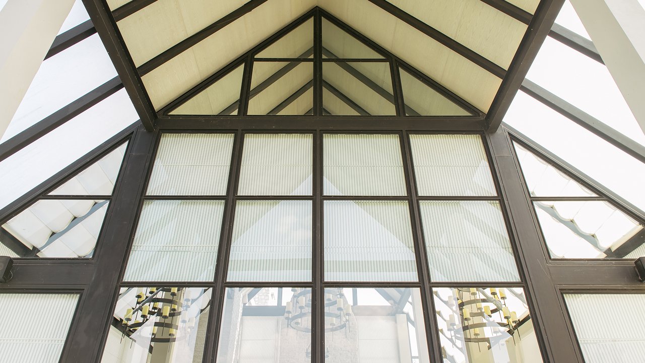 A huge glass window of a sunroom